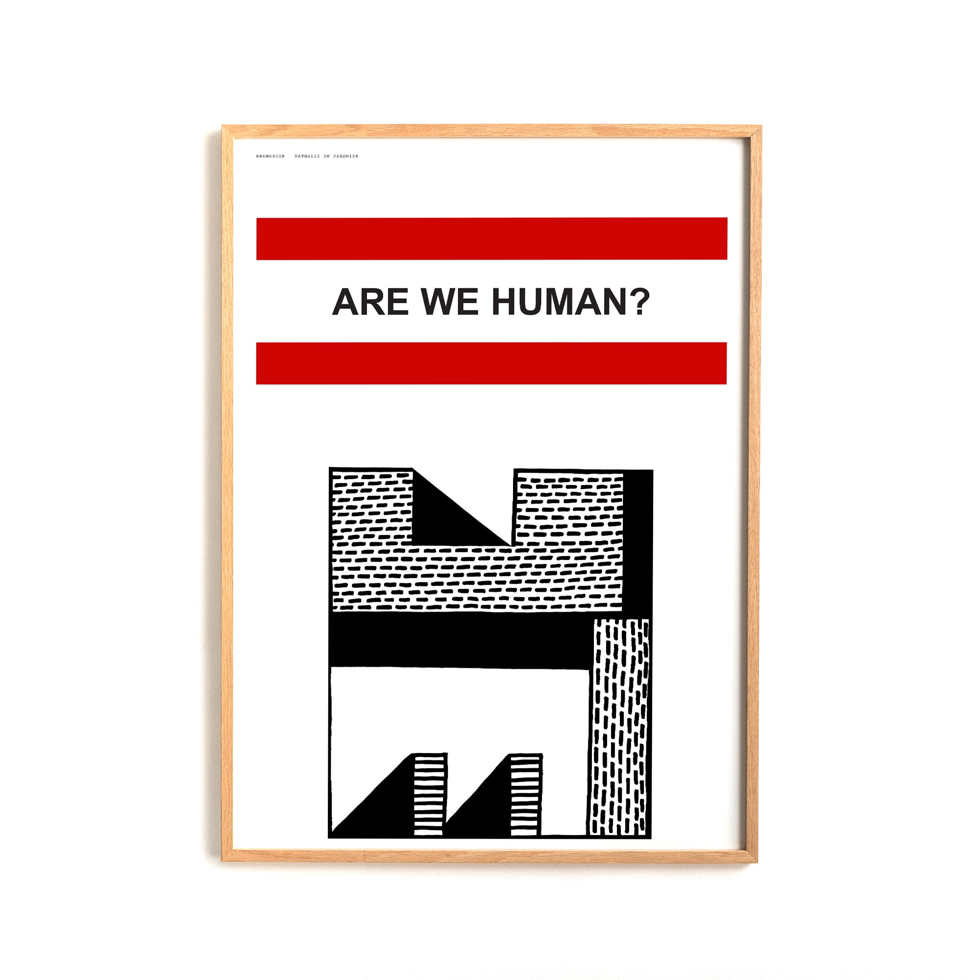 Are we Human shown in an oak frame